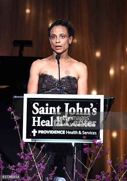 Athlete Joanna Hayes presents the 2016 Hope & Inspiration Award Award at St. John's Health Center 2016 Caritas Gala on October 22, 2016 in Beverly...