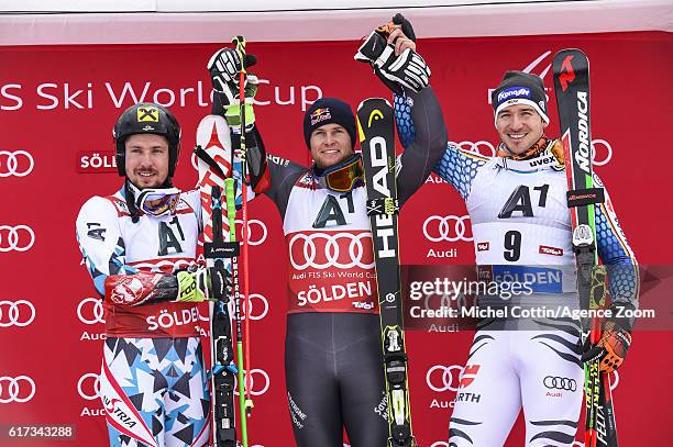 Alexis Pinturault of France takes 1st place, Marcel Hirscher of Austria takes 2nd place, Felix Neureuther of Germany takes 3rd place during the Audi...