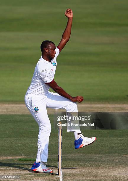 Miguel Cummins of West Indies bowls during Day Three of the Second Test between Pakistan and West Indies at Zayed Cricket Stadium on October 23, 2016...