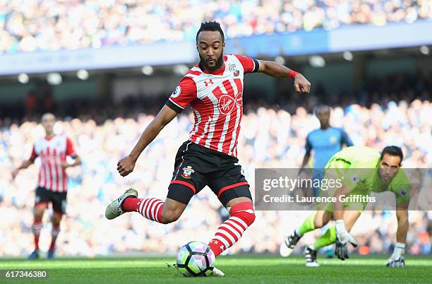 Nathan Redmond of Southampton scores the opening goal during the Premier League match between Manchester City and Southampton at Etihad Stadium on...