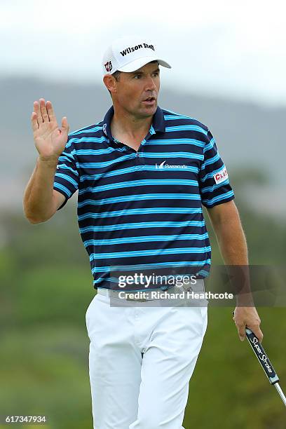 Padraig Harrington of Ireland reacts after a birdie on the 7th hole during day four of the Portugal Masters at Victoria Clube de Golfe on October 23,...