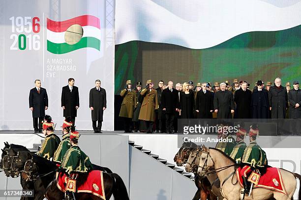 Hungary's Prime minister Viktor Orban , Janos Ader, the President of Hungary , Laszlo Kover Speaker of Hungarian Parliament , inspect Soldiers of the...
