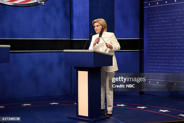 Tom Hanks" Episode 1708 -- Pictured: Kate McKinnon as Democratic Presidential Candidate Hillary Clinton during the "Third Debate Cold Open" sketch on...