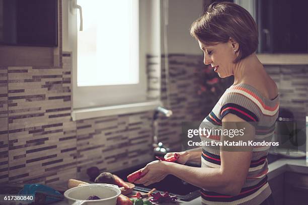 peeling vegetables - peeling food stock pictures, royalty-free photos & images