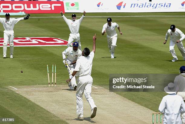 Andrew Caddick of England bowls out Hashan Tillakaratne of Sri Lanka during the 2nd Npower Test Match between England and Sri Lanka at Edgbaston,...