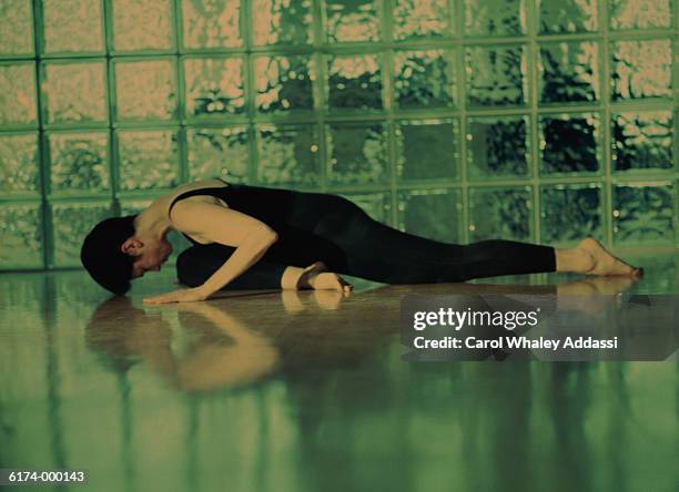 woman and reflection in floor - carol addassi stock-fotos und bilder