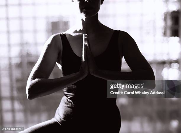 woman in yoga position - carol addassi stock-fotos und bilder