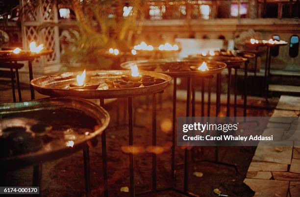 candles on cafe tables - carol addassi stock pictures, royalty-free photos & images