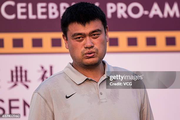 Former NBA star Yao Ming in action during round 2 on the second day of the World Celebrity Pro-Am 2016 Mission Hills China Golf Tournament at...