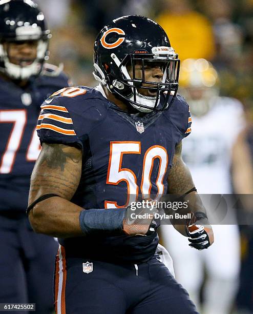 Jerrell Freeman of the Chicago Bears celebrates after making a tackle in the second quarter against the Green Bay Packers at Lambeau Field on October...