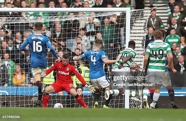 Moussa Dembele of Celtic scores his sides first goal during the Betfred Cup Semi Final match between Rangers and Celtic at Hampden Park on October...