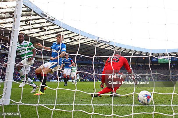 Moussa Dembele of Celtic scores his sides first goal during the Betfred Cup Semi Final match between Rangers and Celtic at Hampden Park on October...