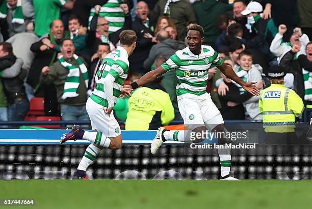Moussa Dembele of Celtic celebrates with Leigh Griffiths of Celtic after he scores through the legs of Matt Gilks of Rangers during the Betfred Cup...