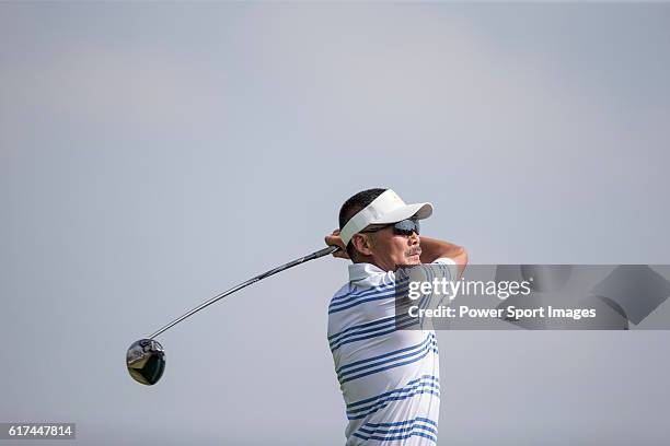 Chinese film director He Ping tees off during the World Celebrity Pro-Am 2016 Mission Hills China Golf Tournament on 22 October 2016, in Haikou,...