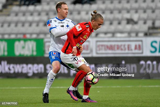 Marcus Falk Olander of IFK Norrkoping and Jesper Karlsson of Falkenbergs FF during the allsvenskan match between IFK Norrkoping and Falkenbergs FF at...