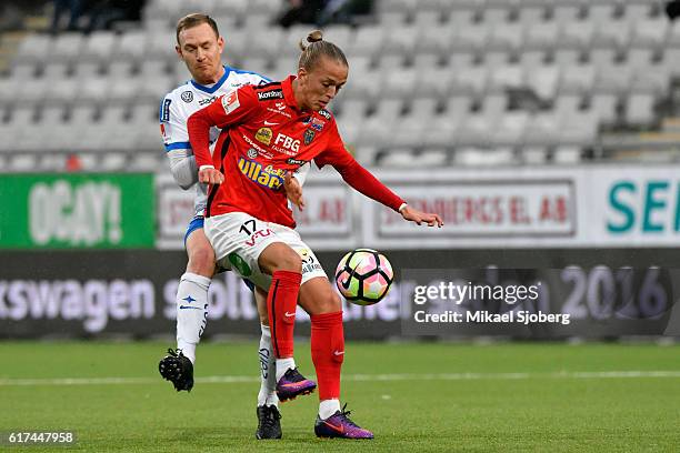 Marcus Falk Olander of IFK Norrkoping and Jesper Karlsson of Falkenbergs FF during the allsvenskan match between IFK Norrkoping and Falkenbergs FF at...