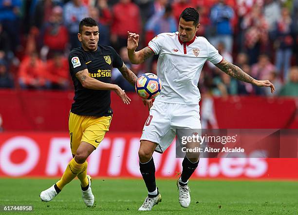 Victor Machin Perez "Vitolo" of Sevilla FC being followed by Angel Correa of Club Atletico de Madrid on during the match between Sevilla FC vs Club...