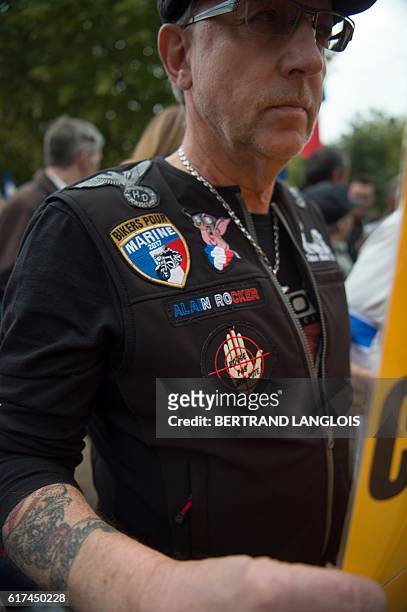 French far-right Front National 's supporter attend a rally against migrants' hosting in La Tour d'Aigues on October 23, 2016. A hundred of FN...