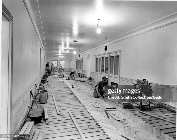 West view in the third floor corridor of the White House during renovation, Washington, DC, December 4, 1951. Courtesy National Archives. .