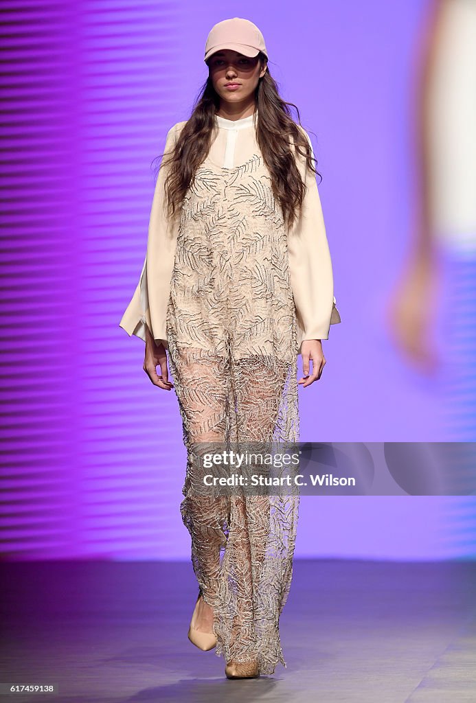 A model walks the runway during the Madiyah Al Sharqi show at Fashion