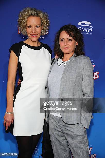 Melanie Wiegmann and Katja Keller attends the red carpet at the premiere of the Mary Poppins musical at Stage Apollo Theater on October 23, 2016 in...