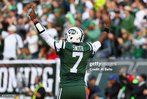 Quarterback Geno Smith of the New York Jets celebrates against the Baltimore Ravens at MetLife Stadium on October 23, 2016 in East Rutherford, New...