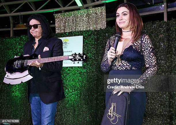 Musician Gene Simmons auctions his guitar during the 17th Annual Yellow Brick Road Gala of Hope at Newlands Golf and Country Club on October 22, 2016...