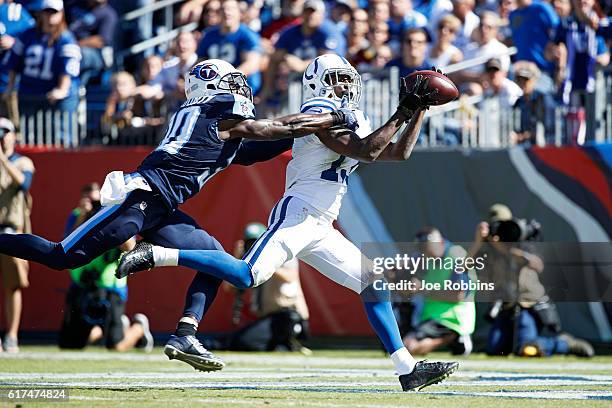 Hilton of the Indianapolis Colts makes a 37-yard touchdown reception against Jason McCourty of the Tennessee Titans in the second quarter of the game...