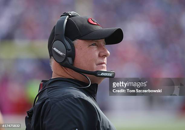 Head coach Chip Kelly of the San Francisco 49ers looks on from the sideline during NFL game action against the Buffalo Bills at New Era Field on...