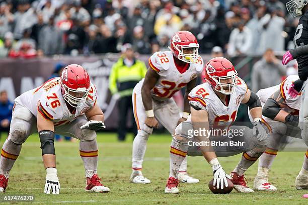 Center Mitch Morse and right guard Laurent Duvernay-Tardif of the Kansas City Chiefs prepare to snap the ball against the Oakland Raiders in the...