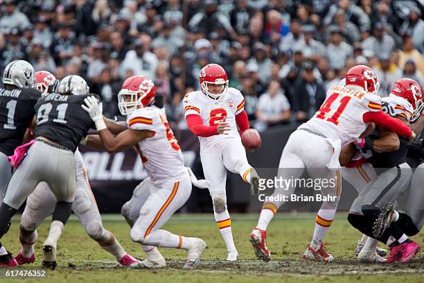 Punter Dustin Colquitt the Kansas City Chiefs sends a 36-yard punt to the Oakland eight yard line in the third quarter on October 16, 2016 at...