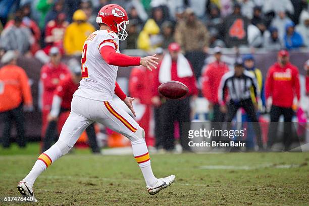 Punter Dustin Colquitt of the Kansas City Chiefs launches the ball 46 yards to the 20 yard line against the Oakland Raiders late in the fourth...