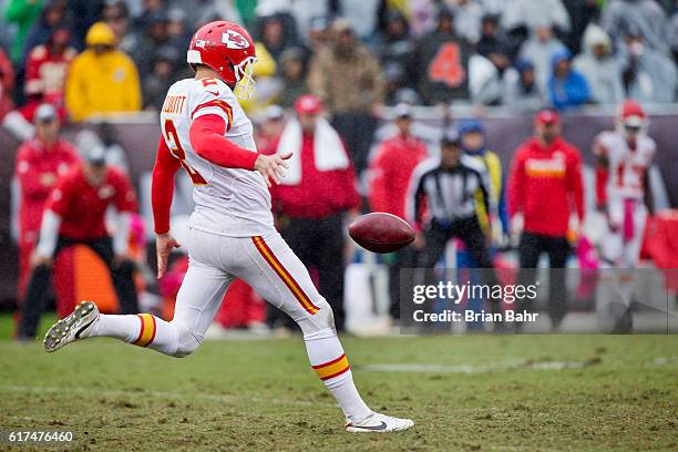 Punter Dustin Colquitt of the Kansas City Chiefs launches the ball 46 yards to the 20 yard line against the Oakland Raiders late in the fourth...