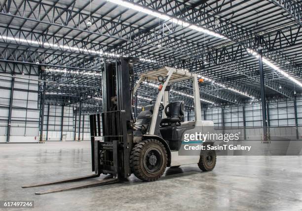 forklift loader in large modern storehouse - newly harvested stock pictures, royalty-free photos & images