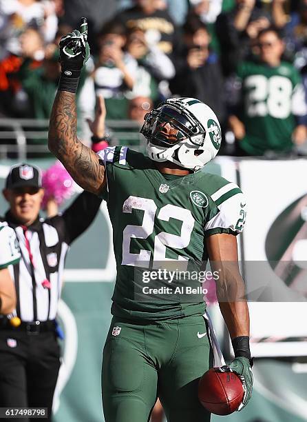 Matt Forte of the New York Jets celebrates his third quarter touchdown against the Baltimore Ravens at MetLife Stadium on October 23, 2016 in East...