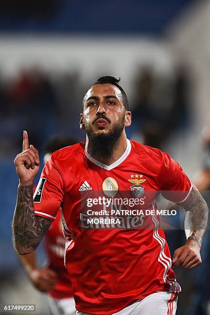 Benfica's Greek forward Konstantinos Mitroglou celebrates a goal during the Portuguese league football match between OS Belenenses and SL Benfica at...