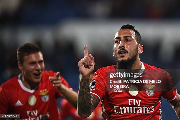 Benfica's Greek forward Konstantinos Mitroglou celebrates a goal during the Portuguese league football match between OS Belenenses and SL Benfica at...
