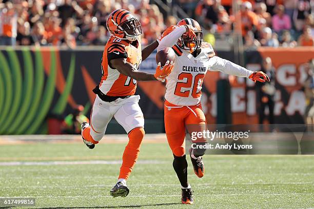 Green of the Cincinnati Bengals makes a one handed catch while being defended by Briean Boddy-Calhoun of the Cleveland Browns during the third...