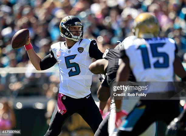 Blake Bortles of the Jacksonville Jaguars attempts a pass against the Oakland Raiders during the game at EverBank Field on October 23, 2016 in...