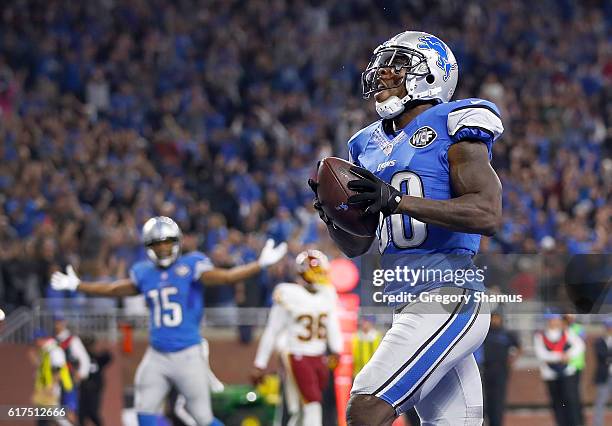 Anquan Boldin of the Detroit Lions and his teammates celebrate Boldin's game winning touchdown against the Washington Redskins at Ford Field on...