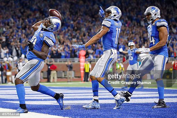 Anquan Boldin of the Detroit Lions and his teammates celebrate Boldin's game winning touchdown against the Washington Redskins at Ford Field on...