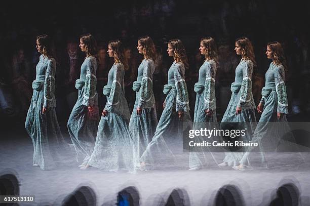 Model walks the runway during the Madiyah Al Sharqi show at Fashion Forward Spring/Summer 2017 held at the Dubai Design District on October 23, 2016...