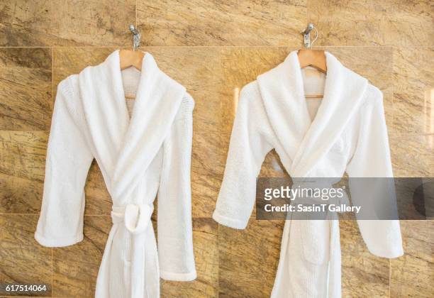 white bathrobe - terry cloth stock pictures, royalty-free photos & images