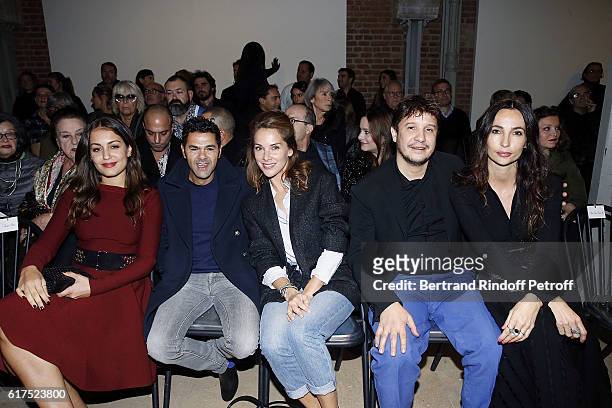 Actress Hiba Abouk, Jamel Debbouze, Melissa Theuriau, Artist Adel Abdessemed and his wife Julia Abdessemed attend the Azzedine Alaia Fashion Show at...