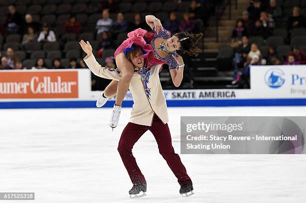 Elena Ilinykh and Ruslan Zhiganshin of Russia perform during the Ice Dance Long Routine on day 3 of the Grand Prix of Figure Skating at the Sears...
