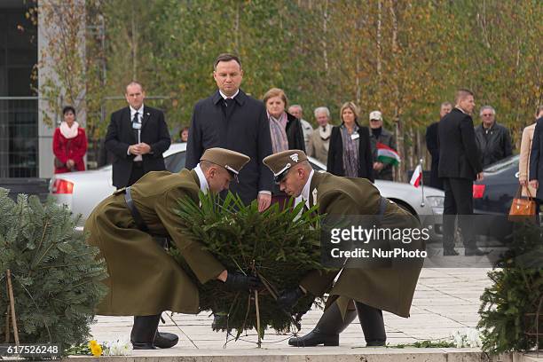 President of Poland Andrzej Duda lays flowers at the monument of Hungarian Revolution of 1956 at New Public Cemetery at Rakoskeresztur in Budapest,...