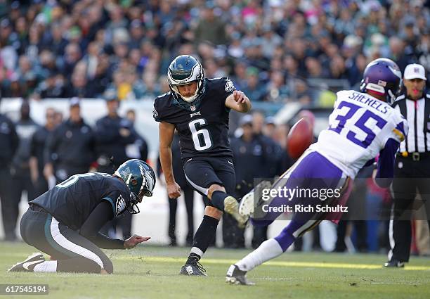 Caleb Sturgis of the Philadelphia Eagles kicks a field goal as Marcus Sherels of the Minnesota Vikings attempts a block during the fourth quarter of...