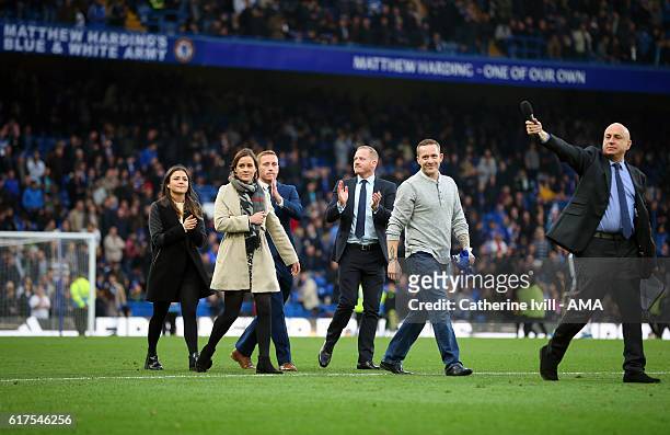 The family of Matthew Harding walk around the pitch as the club commemorate the 20 year anniversary of the death of the former Chelsea vice chairman...