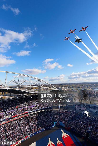 Flyover is performed during the national anthem before the start of the 2016 Tim Hortons NHL Heritage Classic between the Edmonton Oilers and the...