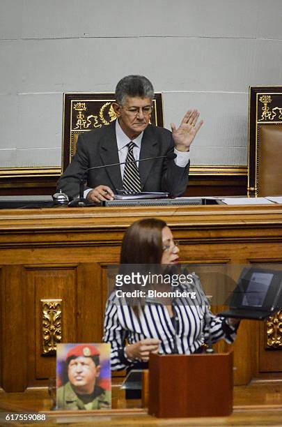 Henry Ramos Allup, speaker of Venezuela's National Assembly, gestures as Tania Diaz, deptuy of Venezuela's National Assembly, gives a speech on the...